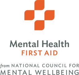 Logo with an orange cross above the words Mental Health First Aid and National Council for Mental Wellbeing in smaller text underneath.